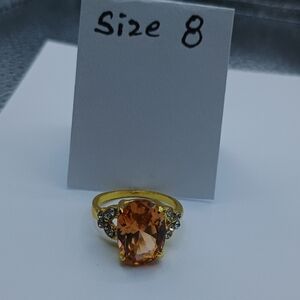 Elegant Gold and Orange Gemstone Ring